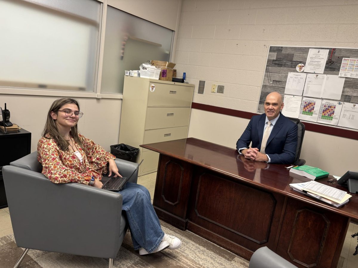 Senior, Kylie Burgo, interviewing new Superintendent, Christopher Haskins